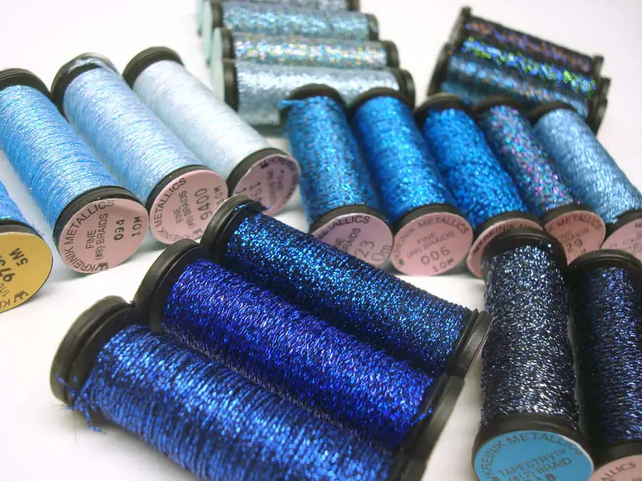 Range of blue metallic threads in the Kreinik Braids and Ribbons line, www.kreinik.com.