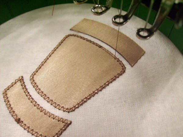 Tack-down zig-zagging is a fundamental part of embroidery patches