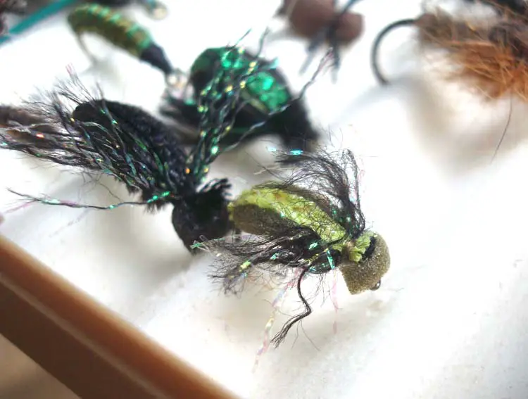 Fly fishing fans often make their own lures, using needlework threads and craft materials to replicate bugs and other natural creatures.