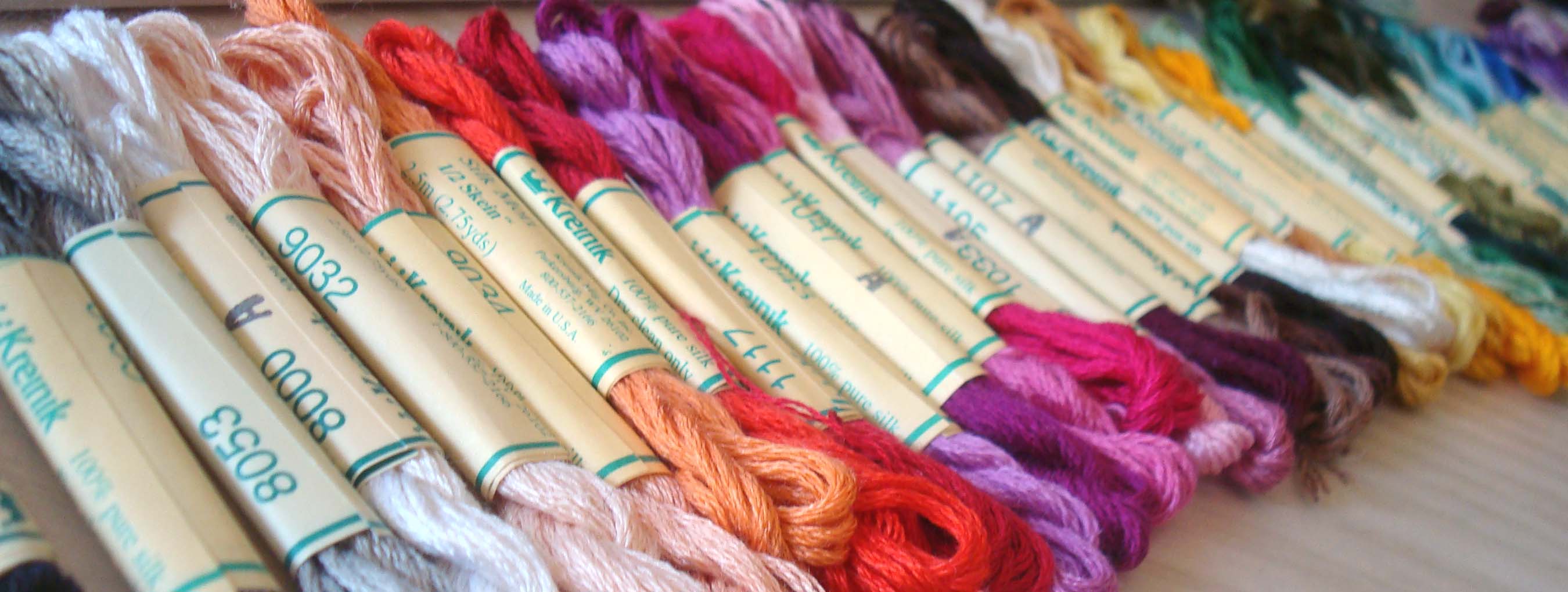 Notice the "A" on some of the labels of these Kreinik Silk Mori skeins? That indicates a new dye lot. Check labels on all of your threads to see if there is a dye lot designation.