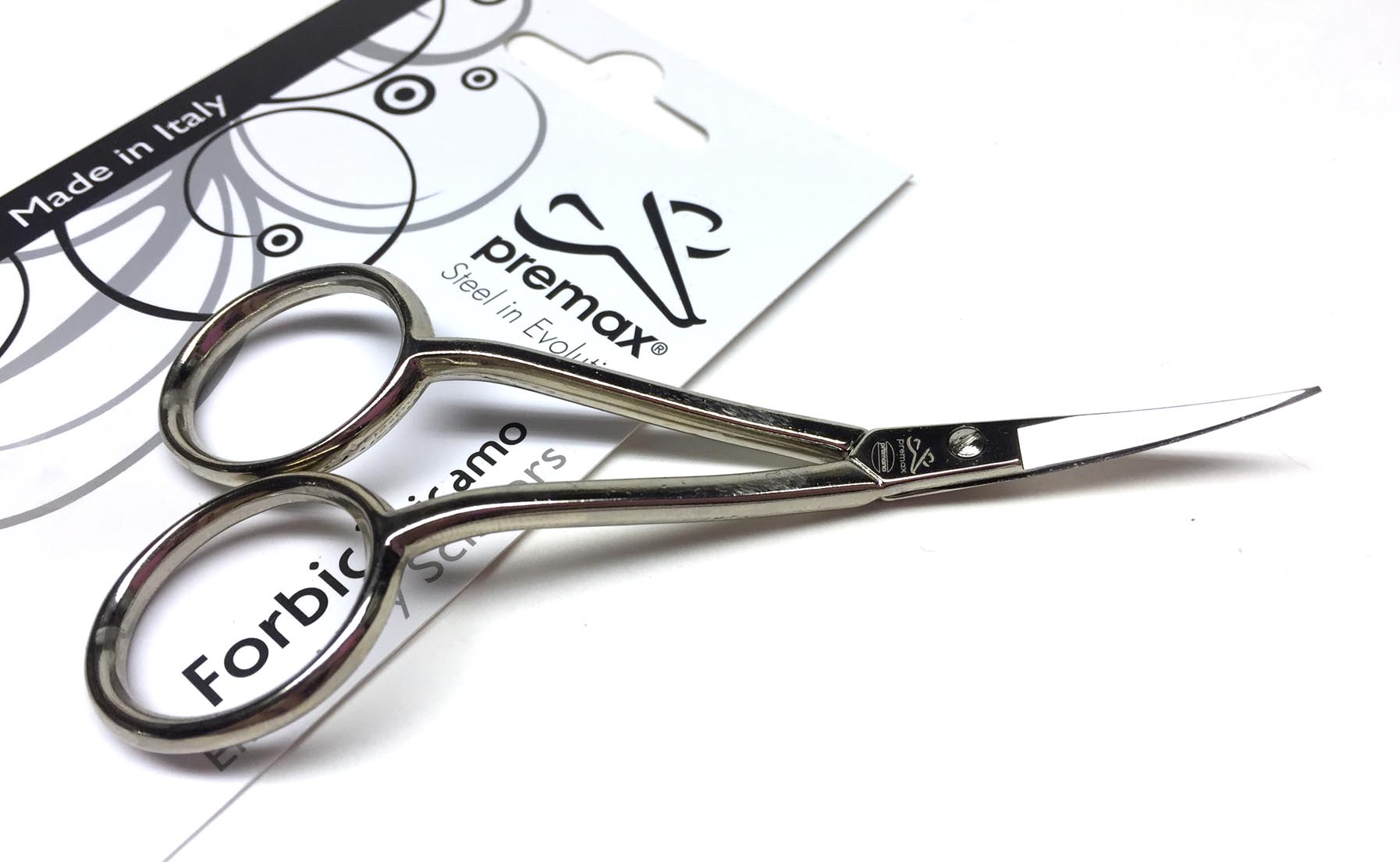 This curved embroidery scissor helps you get into tight spots—including cutting while your project is in a hoop or frame. Angled scissors rock!