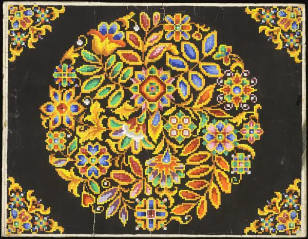 Round stylised leaves and flowers needlepoint pattern on black background