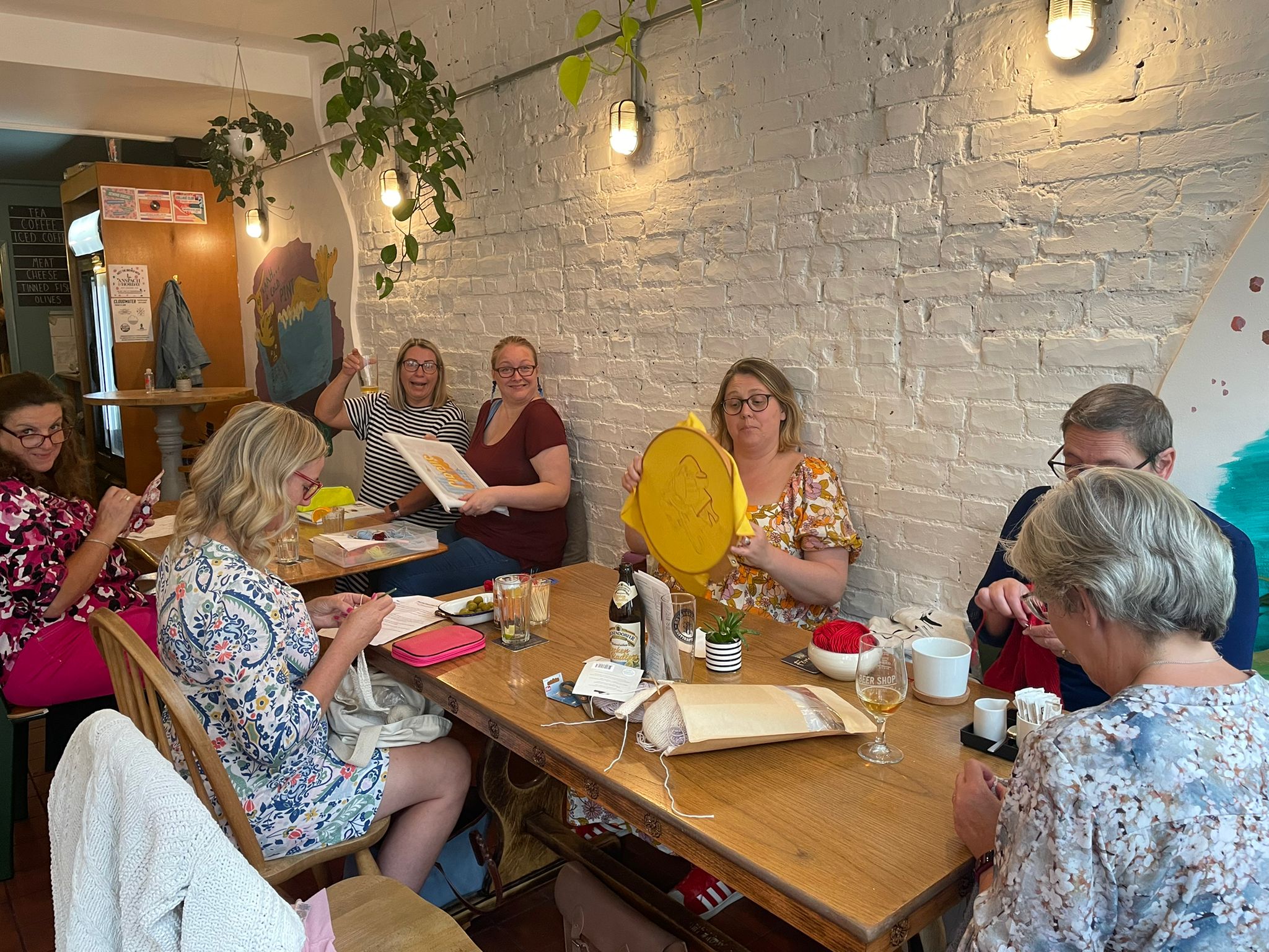 A group of women meet in The Beer Shop in Folkestone for a regular sewing social