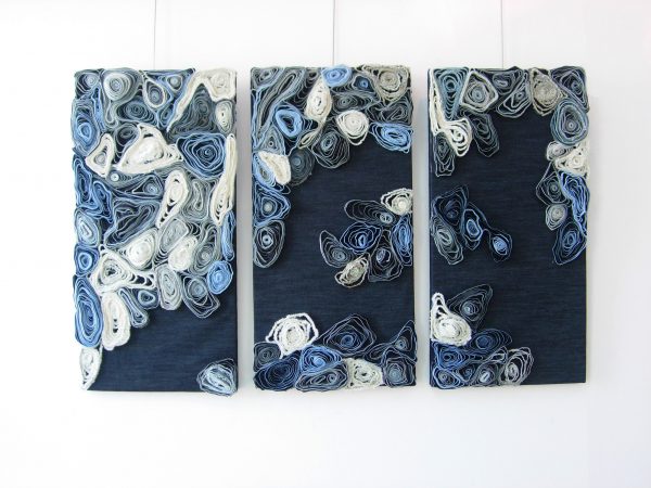 Revolutionizing Art With Denim: A Fabric'S Journey From Functional To Fashionable Rolled art wall piece by Ludingirra